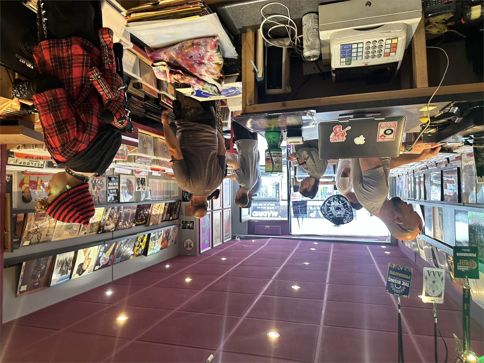 Customers browsing records inside a busy Psychotron Records