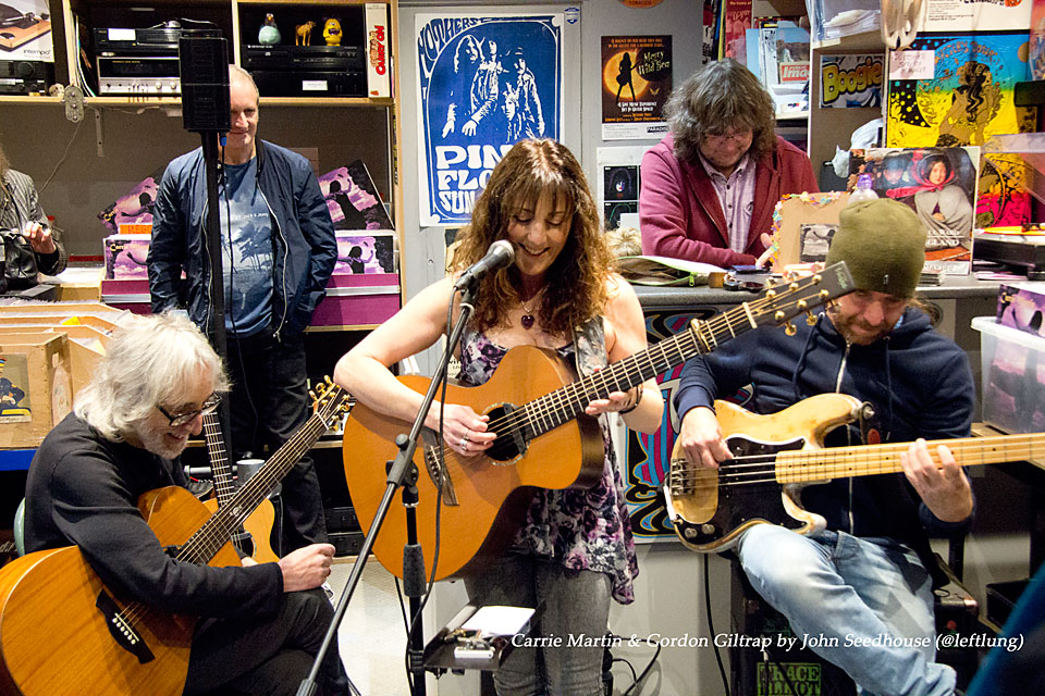 Gordon Giltrap Carrie Martin and Jamie Fowler performing in the Psychotron Records shop